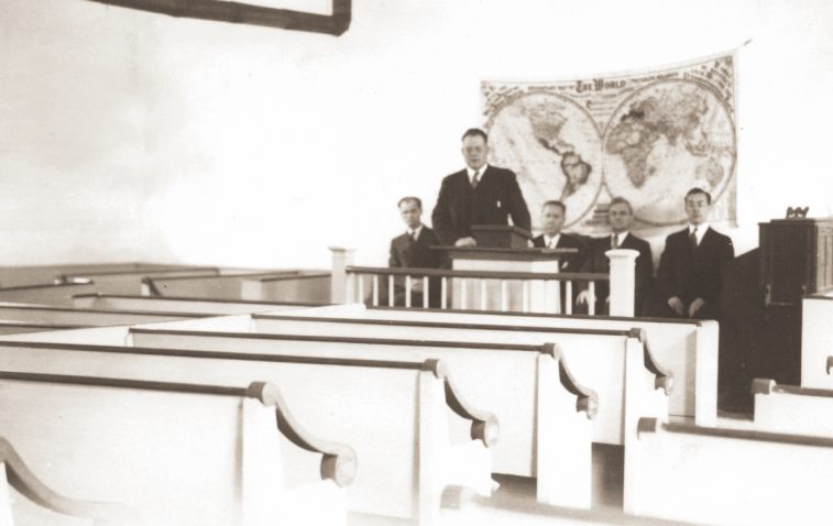 Arthur L. White, grandson of Ellen White and third son of William Clarence and Ethel May (Lacey) White, inside the church near Washington, New Hampshire.