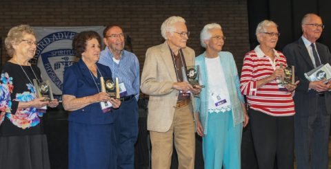 Members of the 70-year classes receive special recognition at the 100th anniversary ceremony.