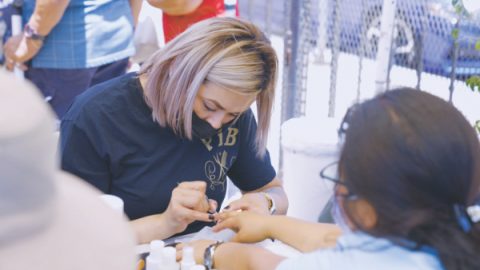 Students and teachers from Professional Institute of Beauty School offered free nail care services.