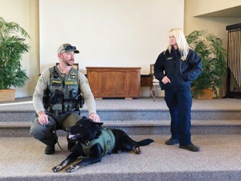 Bishop students and staff were very impressed as K-9 service dog, Fight, shows off his ability to listen and obey when hearing commands from his partner, Deputy Noonan.